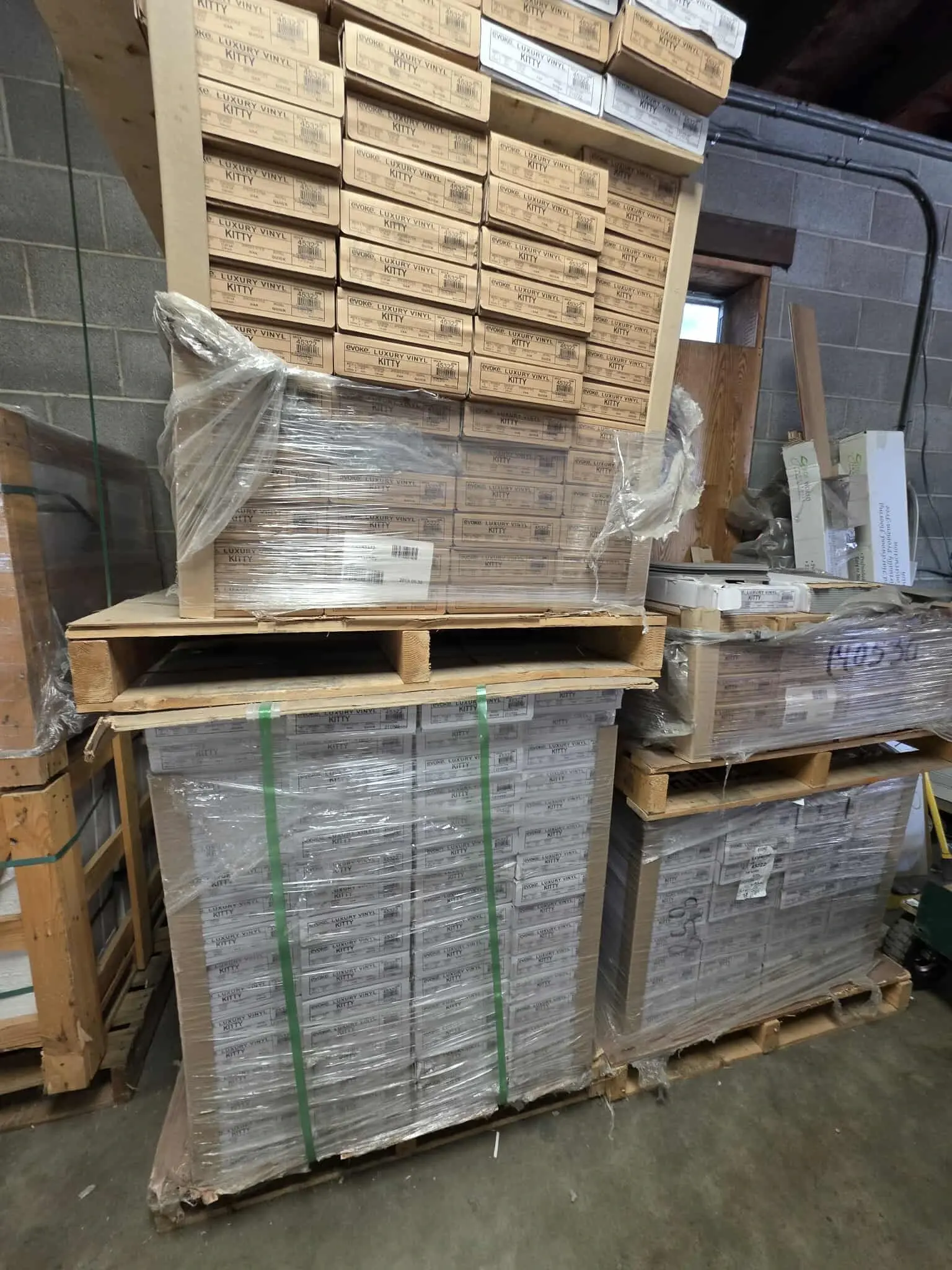A photo of pallets of Evoke LVP flooring